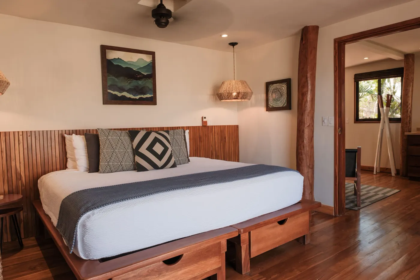 Canopy suite at TreeCasa — private balcony and hammocks overlooking the forest