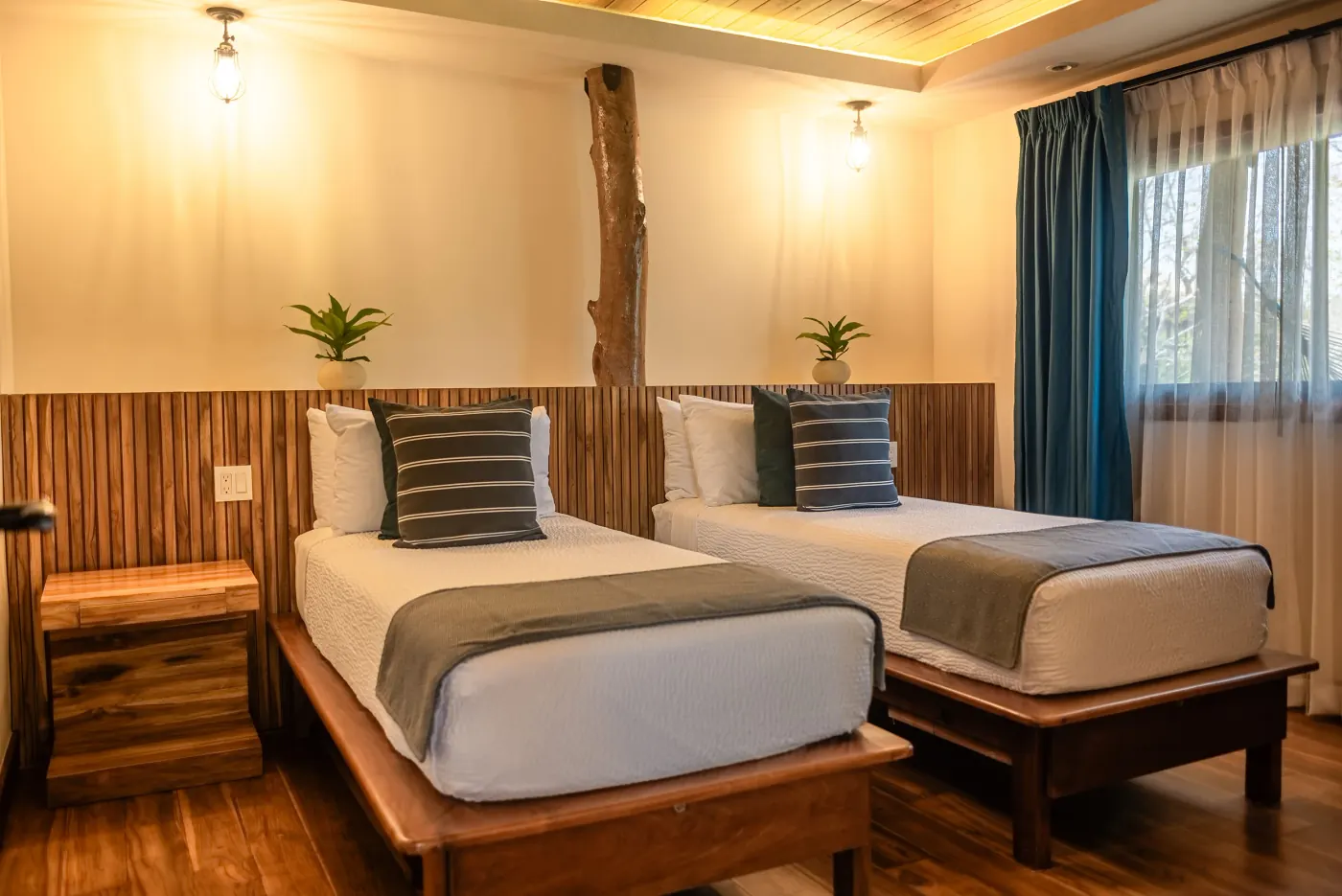 Family Suite at TreeCasa — two-storey suite with multiple bedrooms and balconies
